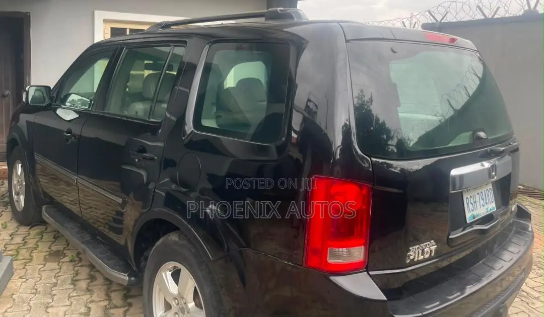 Honda Pilot Touring 4dr SUV 4WD (3.5L 6cyl 5A) 2009 Black