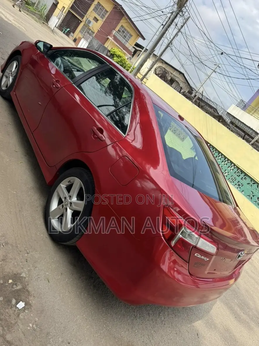 Toyota Camry SE 4dr Sedan w/Prod. End 11/13 (2.5L 4cyl 6A) 2014 Red