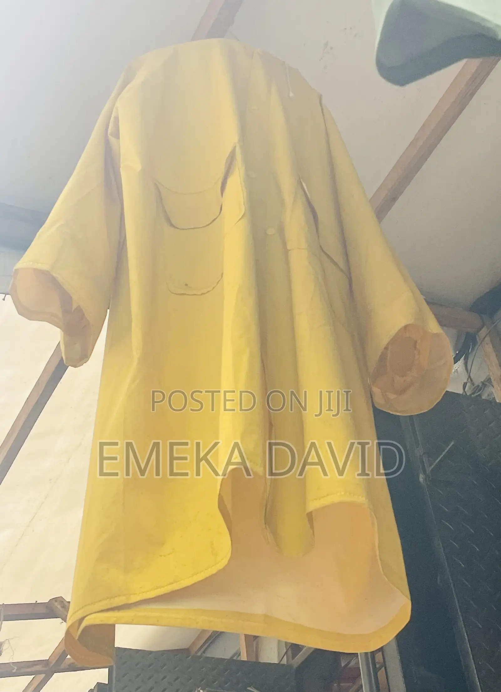 Waterproof Gown PVC Raincoat in Suitable for Rainy Conditions.