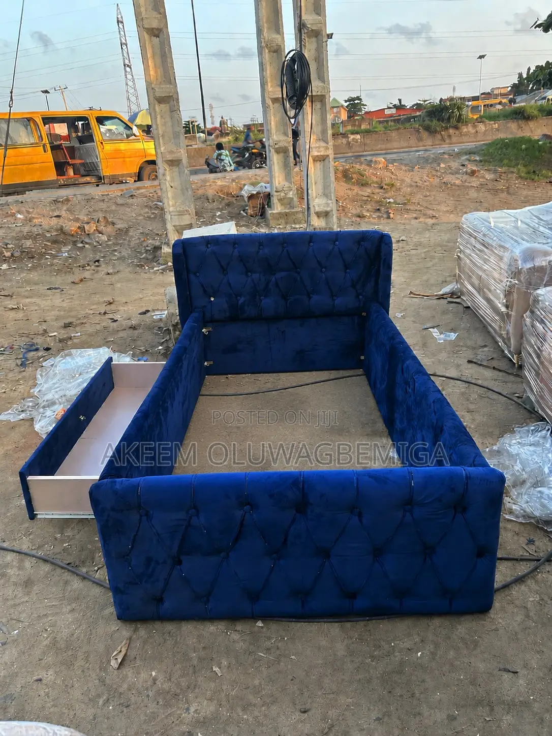 3by6 Button Tufted Blue Bedframe With Drawer by the Side
