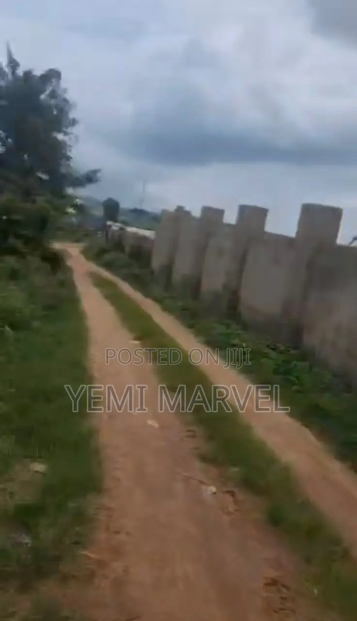 Fenced and Gated 911sqm of Land With C of O at Quarry, Asunle Road
