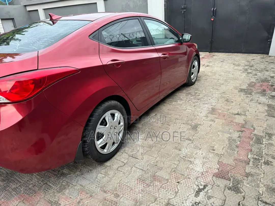 Hyundai Elantra GLS Sedan FWD (1.8L 4cyl 6M) 2013 Red