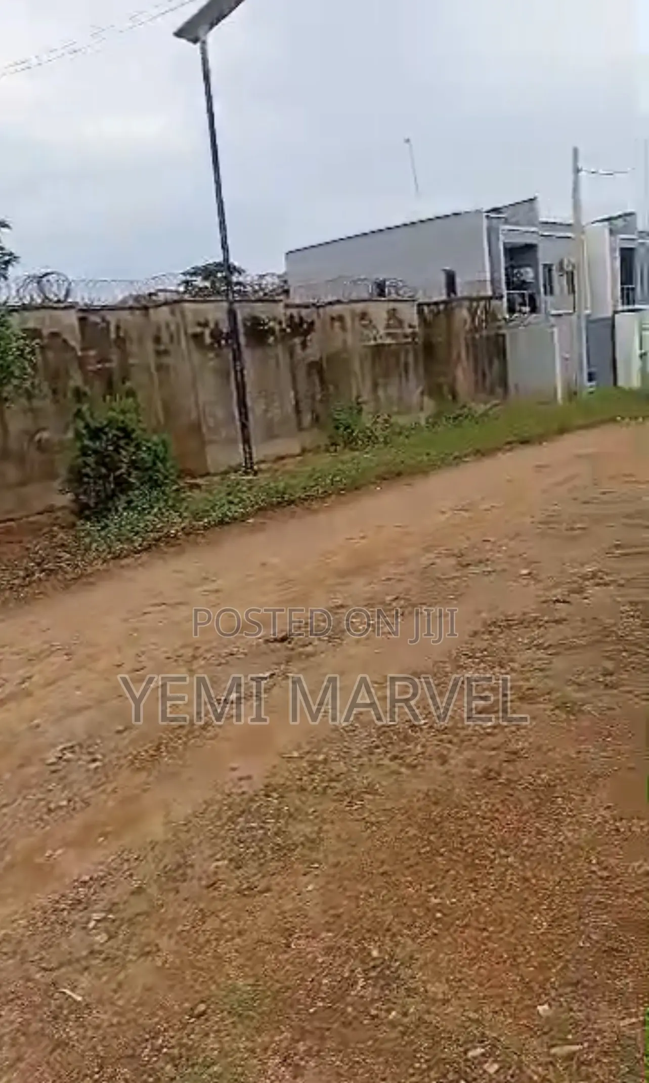 2701sqm Fenced and Gated Land With C of O at Alalubosa Main GRA