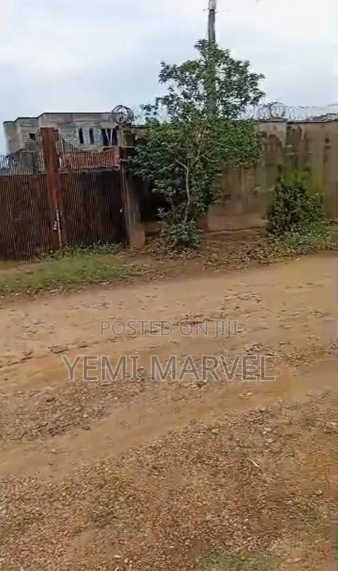 2701sqm Fenced and Gated Land With C of O at Alalubosa Main GRA