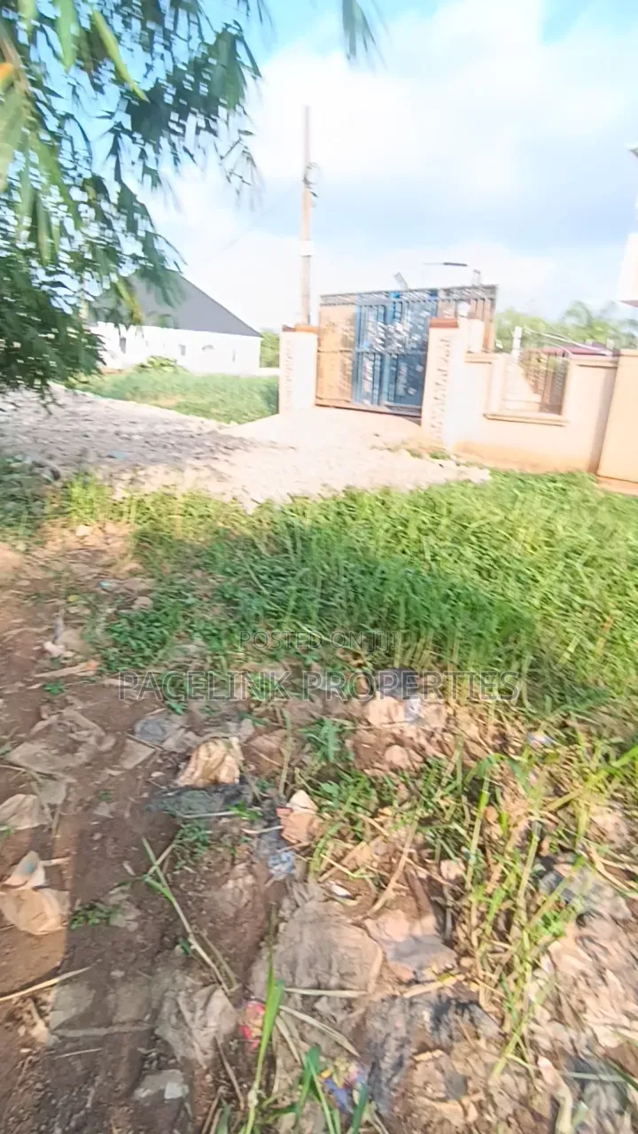 More Than Half Plot of Land in a Very Decent Area Close Not Too Far Fr