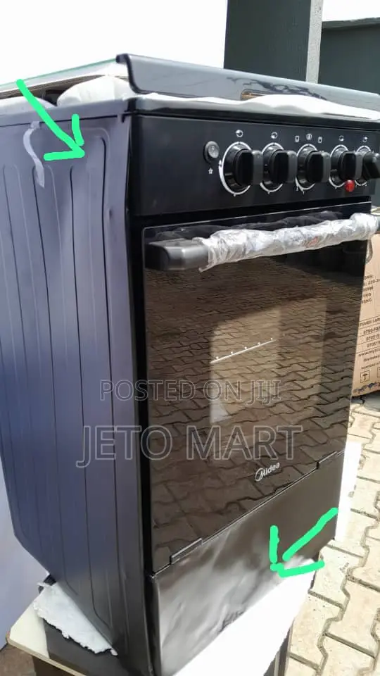 Midea Standing Cooker 3 Gas, 1 Electric 
Dented at the Sides