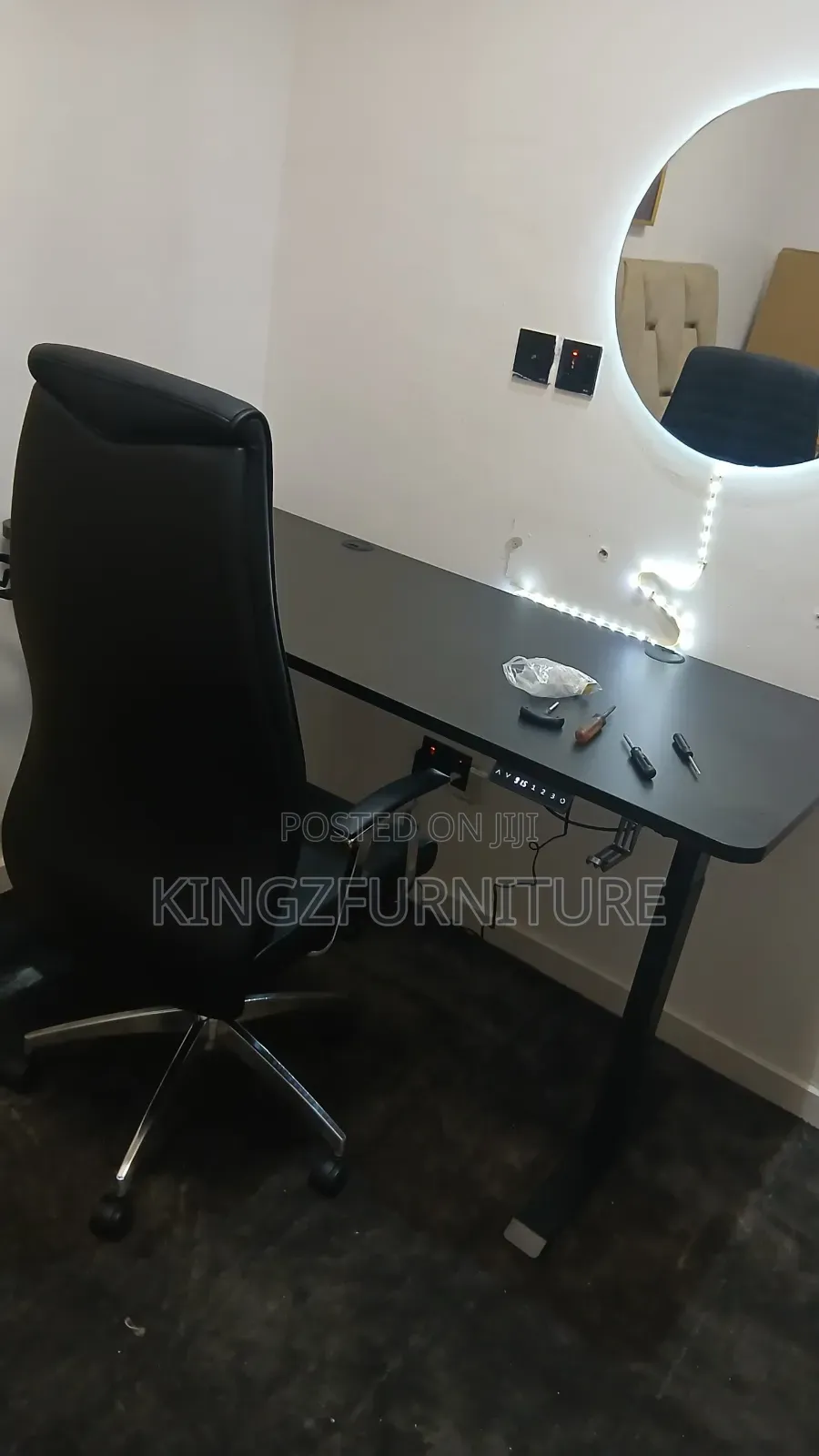 Office Chair Paired With a Electric Height-Adjustable Standing Desk.