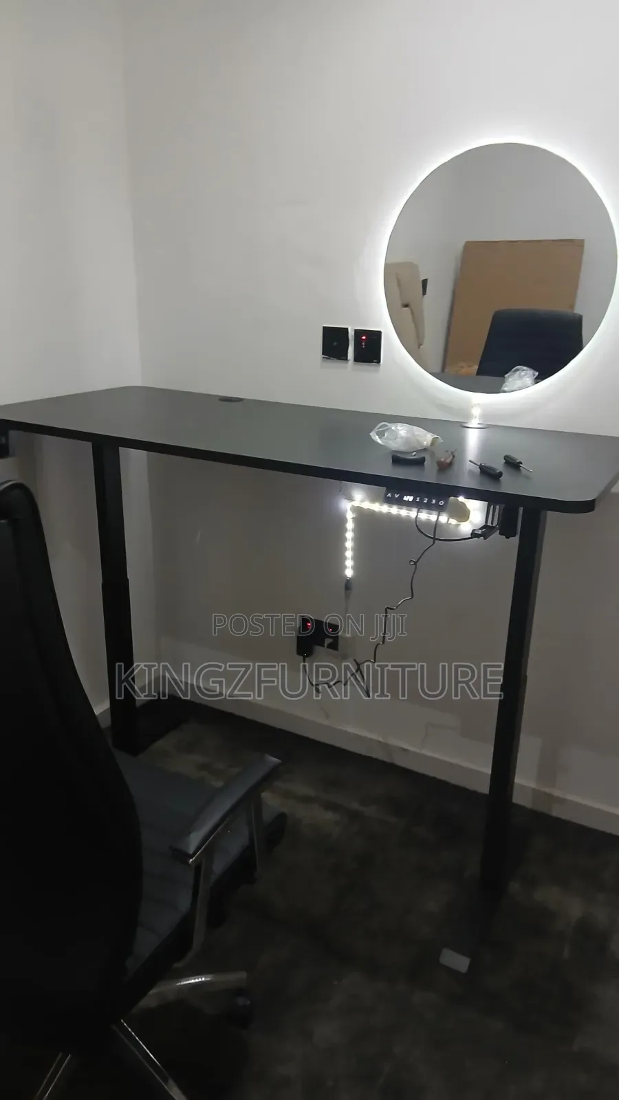 Office Chair Paired With a Electric Height-Adjustable Standing Desk.
