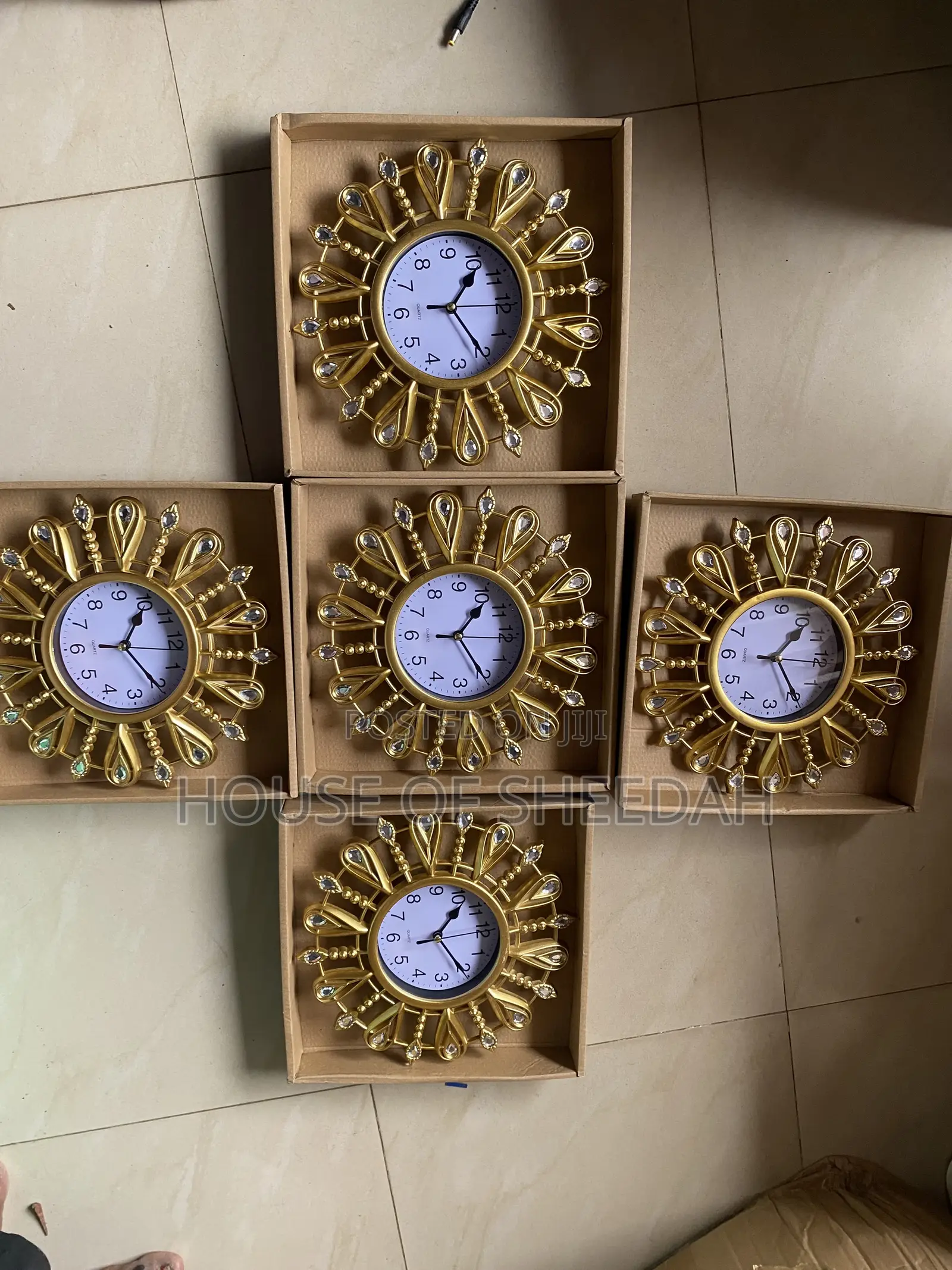 A Decorative Gold Sunburst Clock
