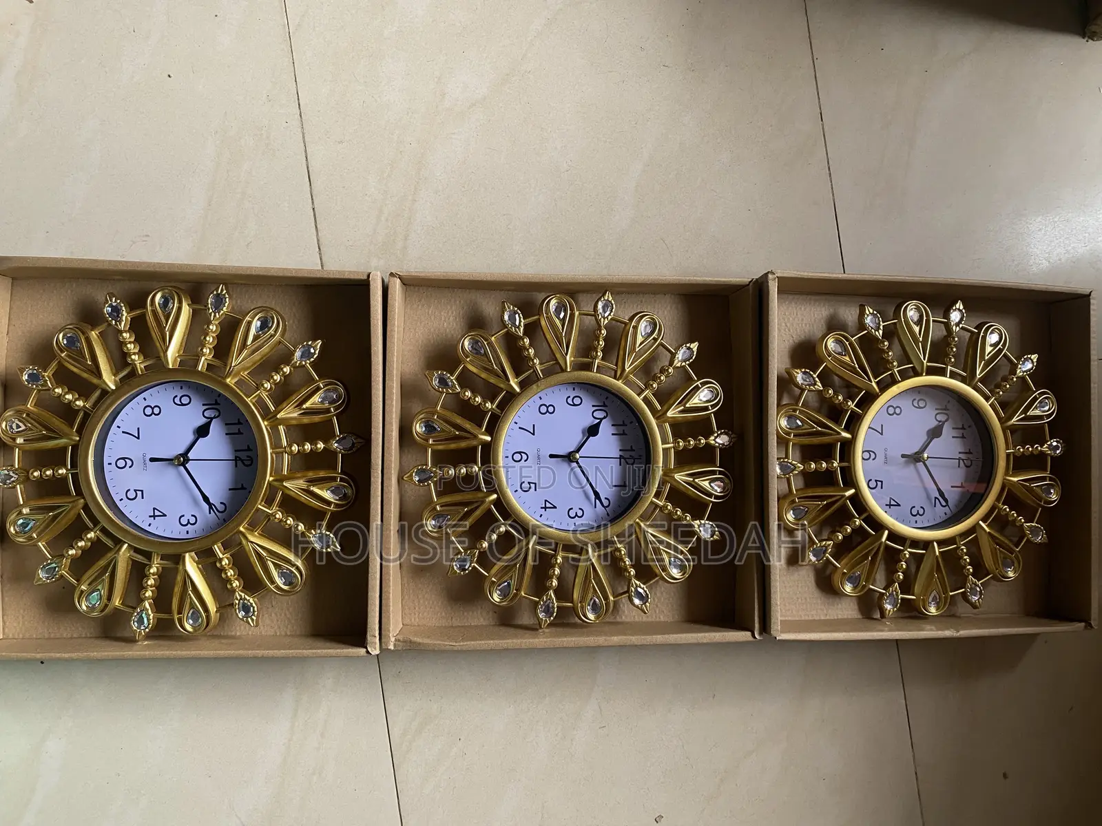 A Decorative Gold Sunburst Clock