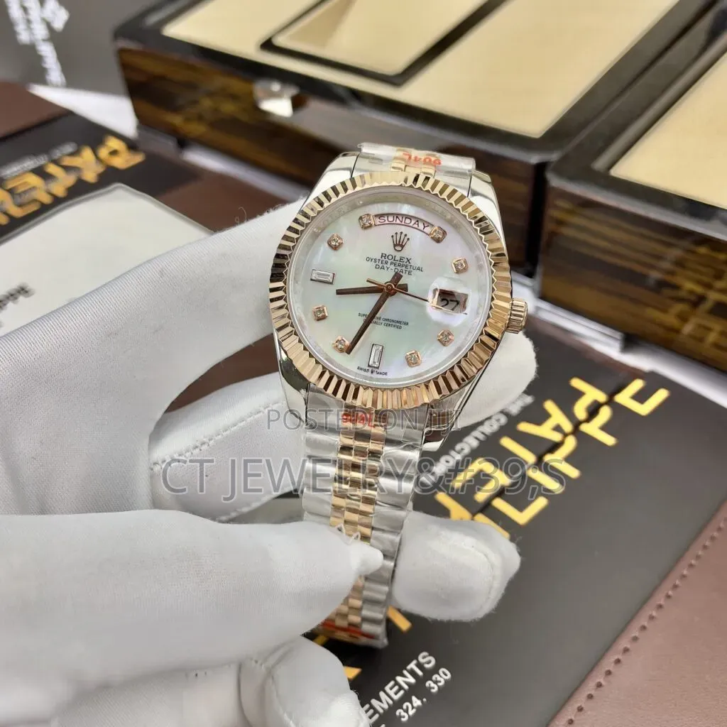 Rolex Day-Date Features a Two-Tone Steel and Rose Gold Diamond Dial.
