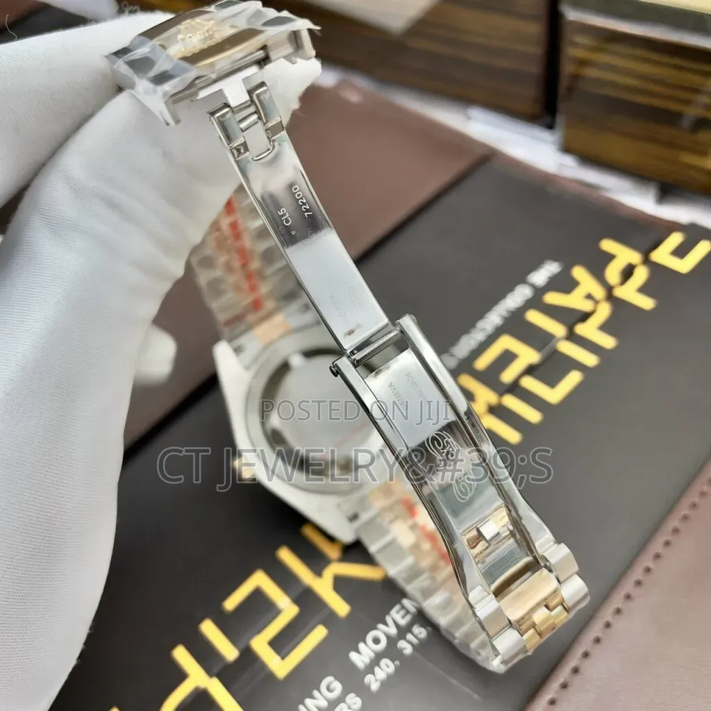 Rolex Day-Date Features a Two-Tone Steel and Rose Gold Diamond Dial.