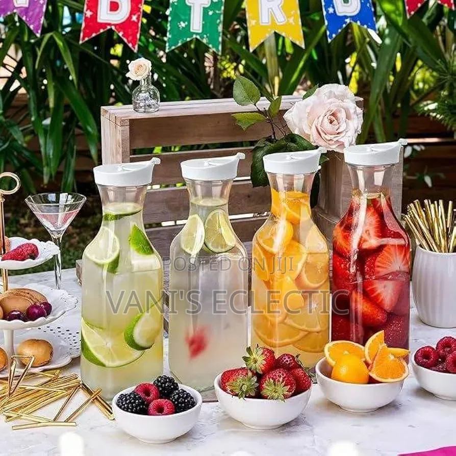 Juice Pitchers With Flip-Top Lids