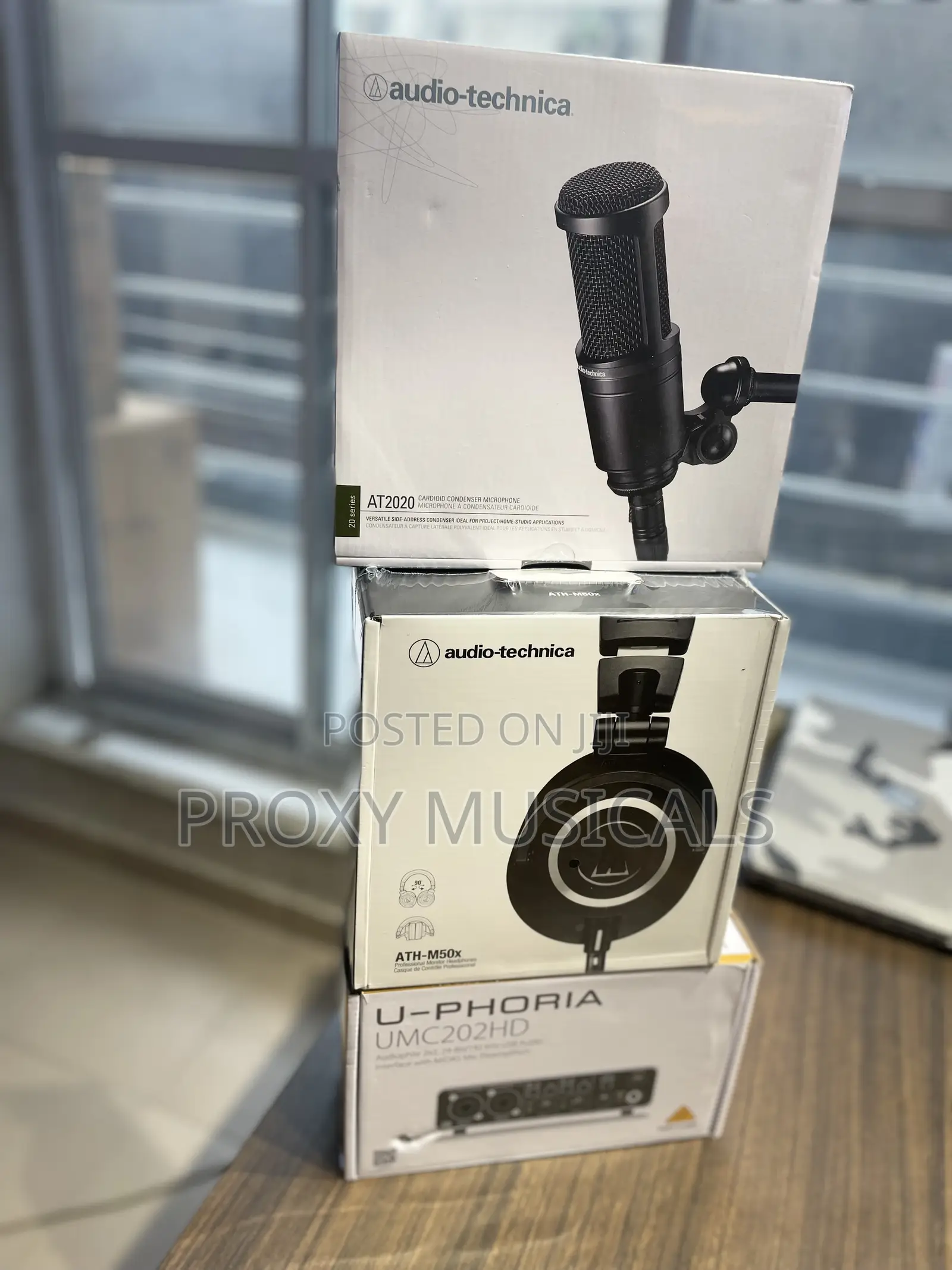 Audio Technica ATH M50x Headphone, Behringer UMC202HD AT2020 Mic