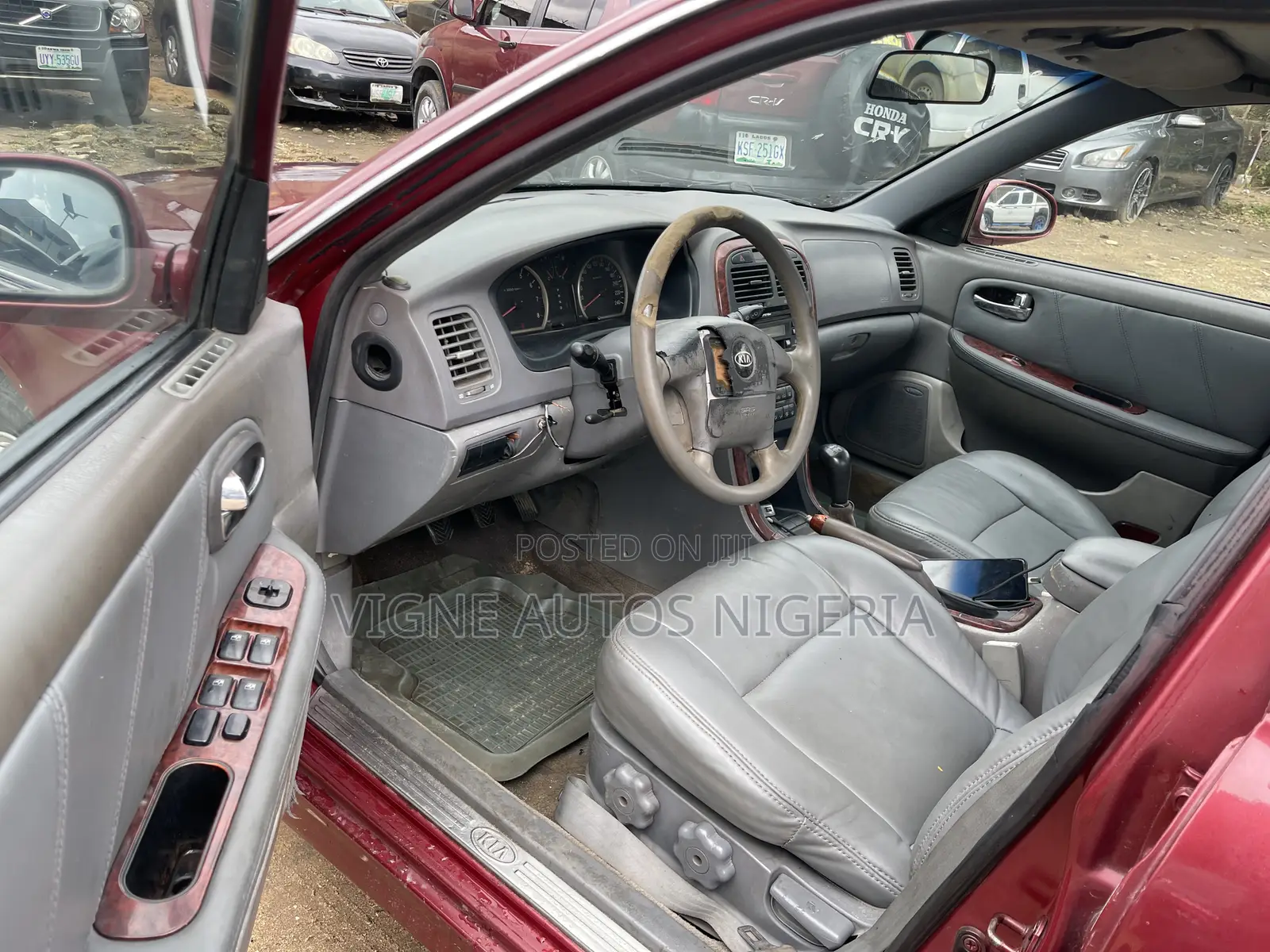 Kia Optima LX Sedan FWD (2.4L 4cyl 5M) 2003 Red