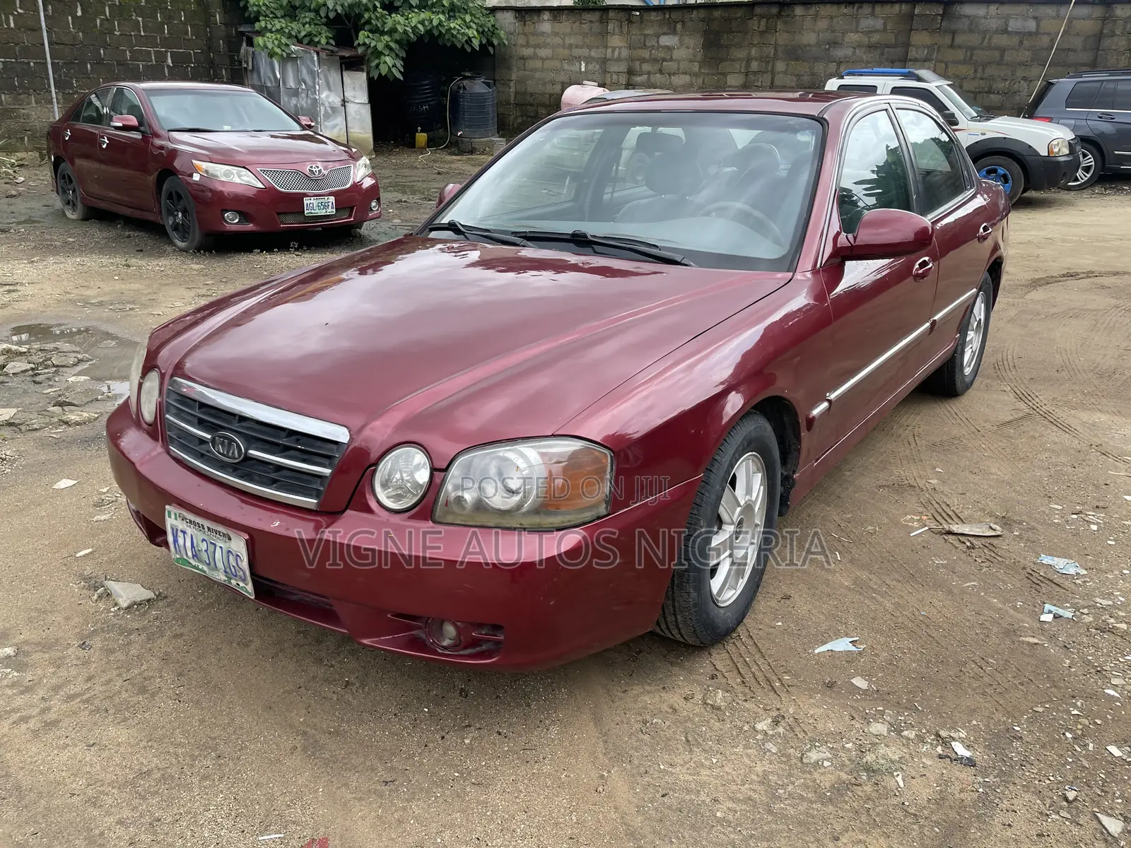 Kia Optima LX Sedan FWD (2.4L 4cyl 5M) 2003 Red