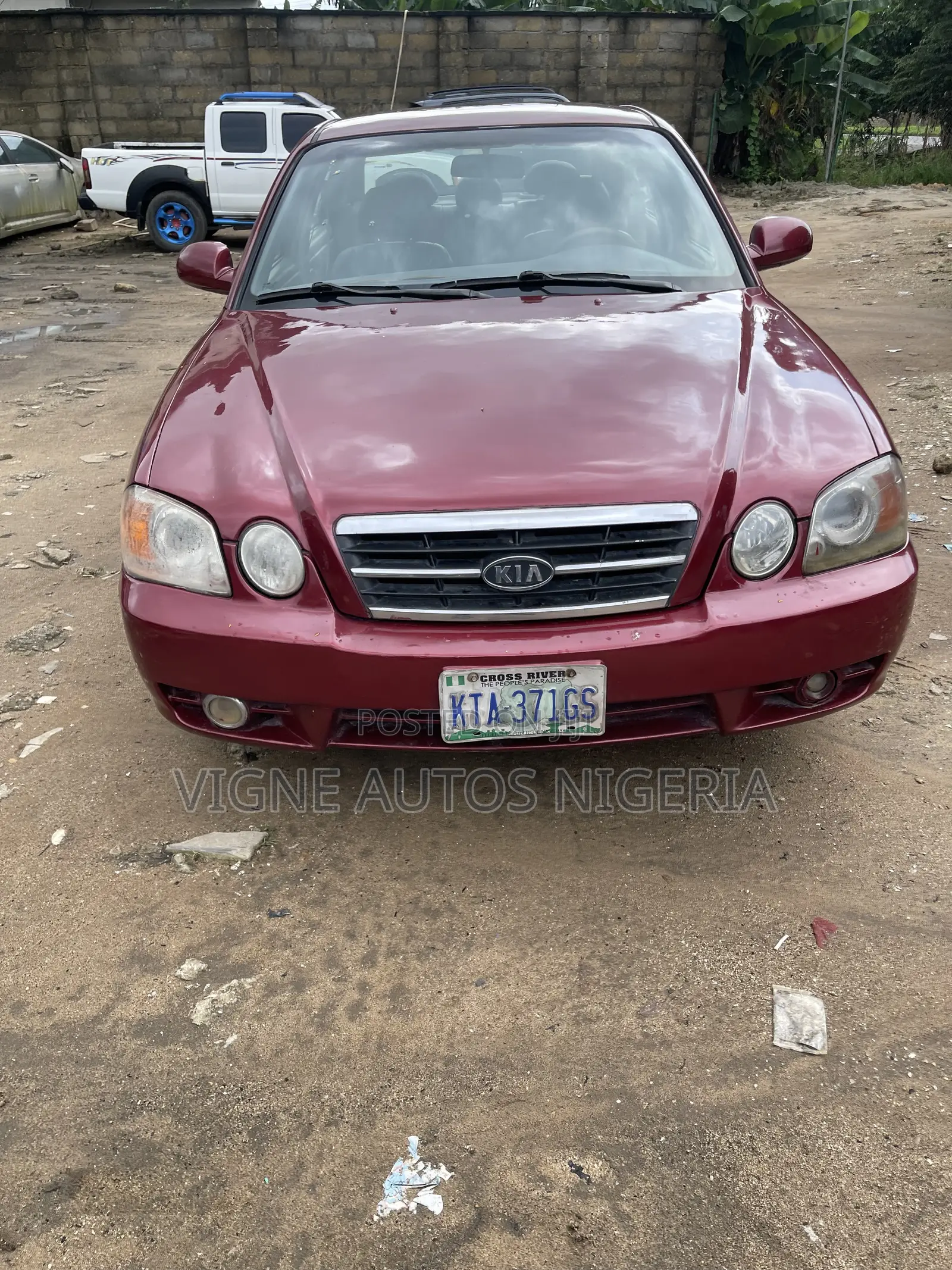 Kia Optima LX Sedan FWD (2.4L 4cyl 5M) 2003 Red