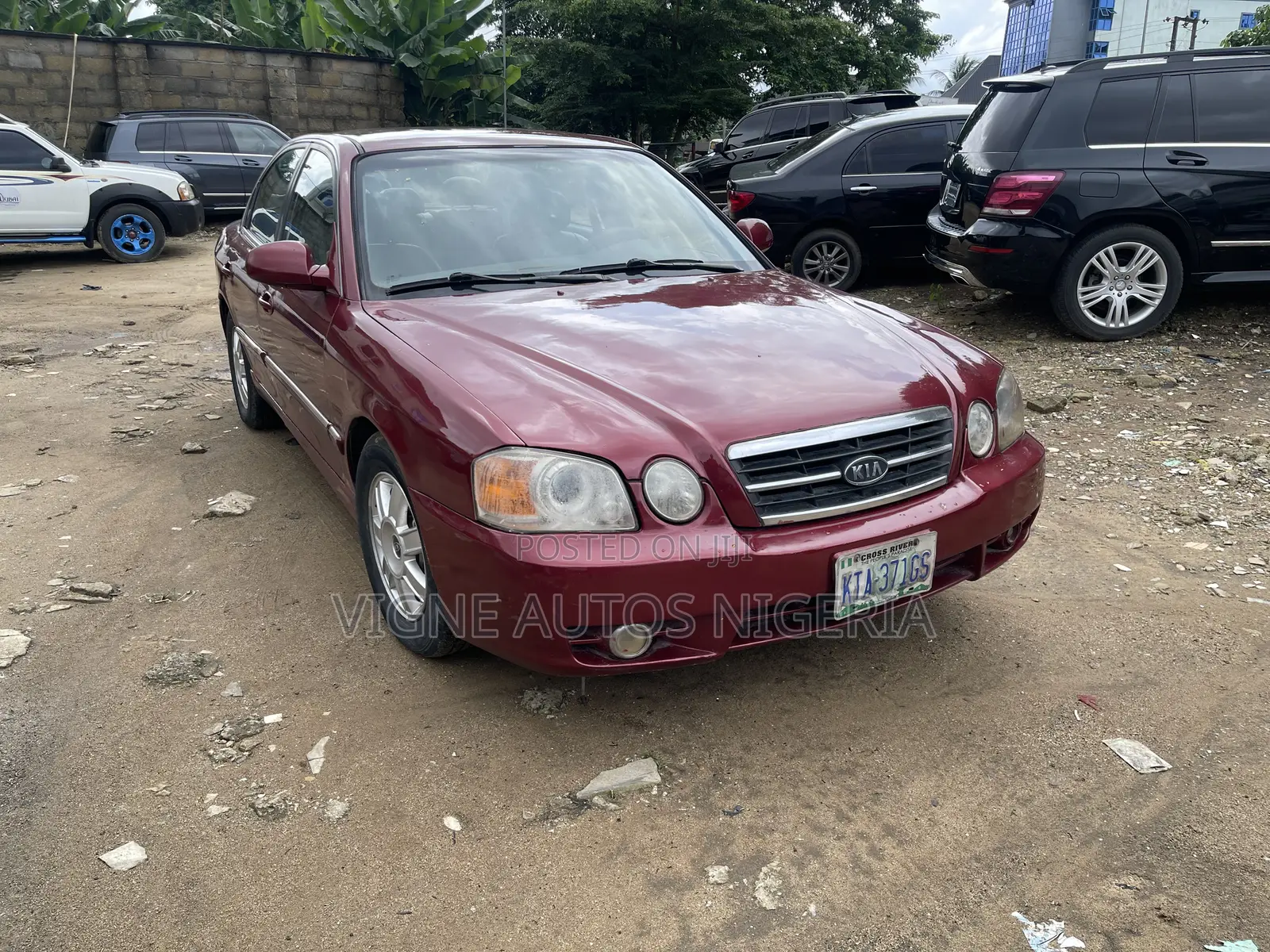 Kia Optima LX Sedan FWD (2.4L 4cyl 5M) 2003 Red