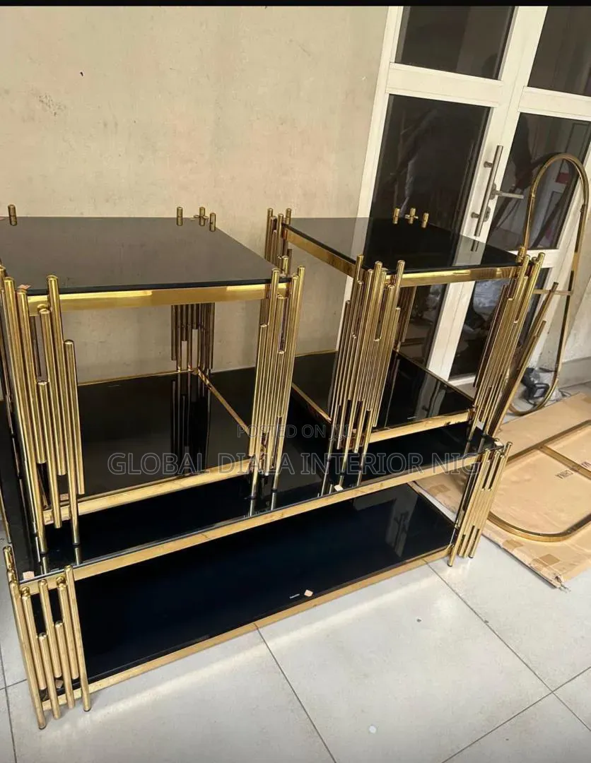 Set of Gold and Black Glass Tables