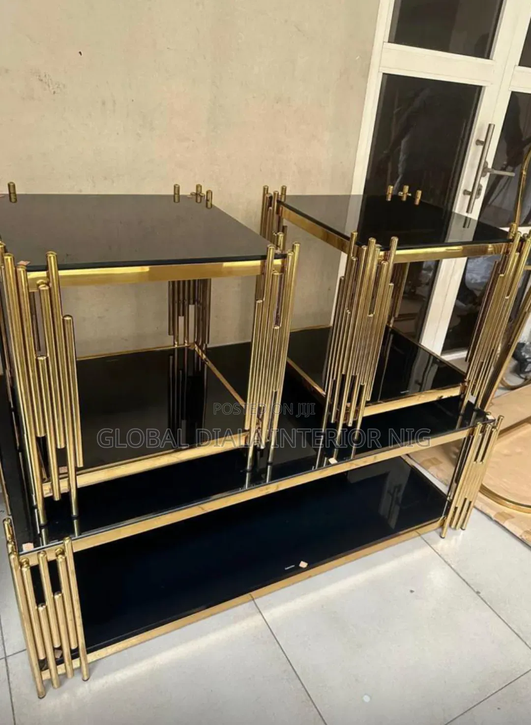 Set of Gold and Black Glass Tables