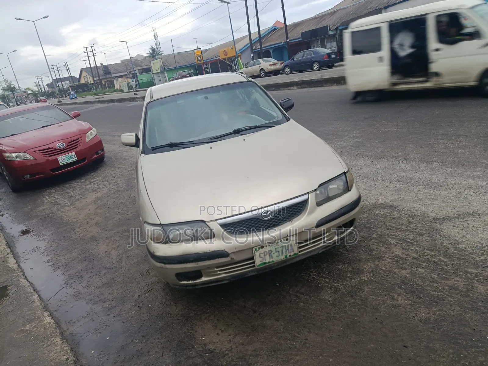 Mazda 323 2005 Gold