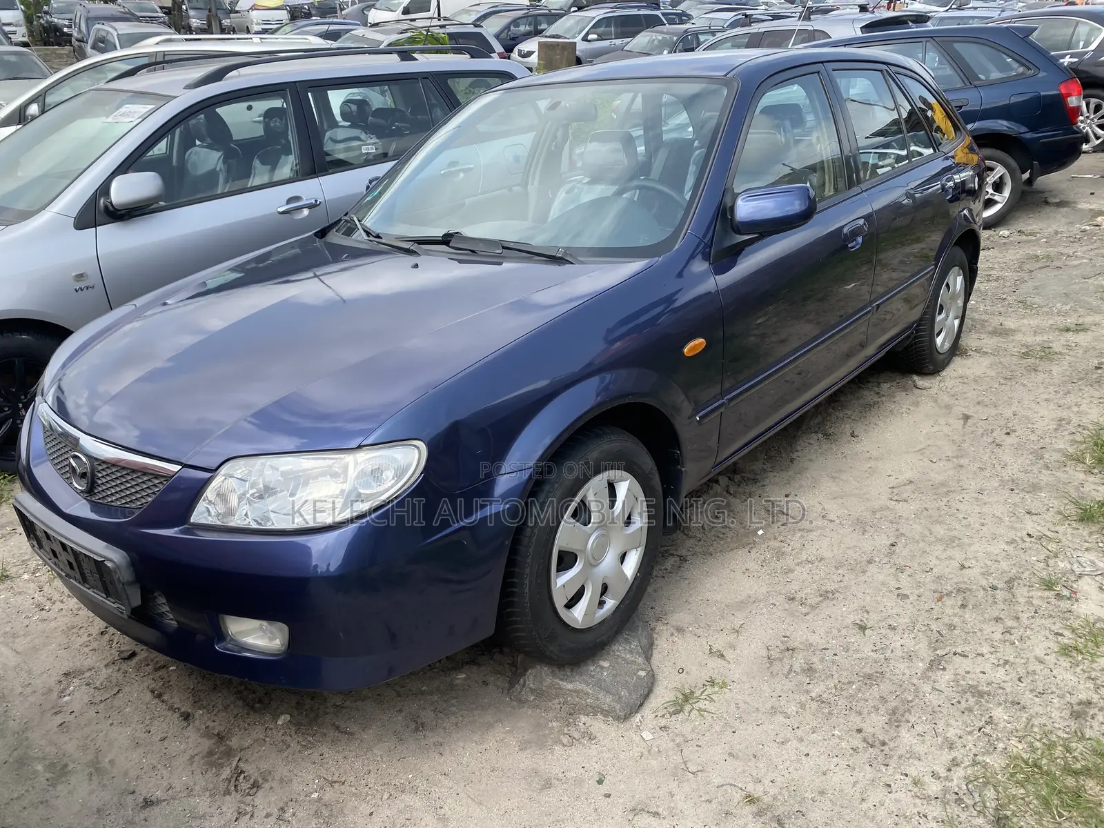 Mazda 323 2004 Blue