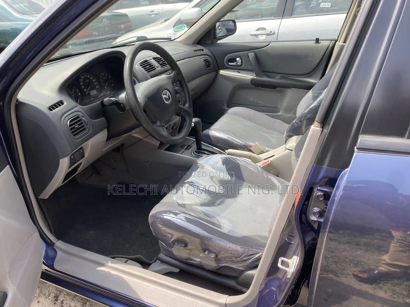 Mazda 323 2004 Blue