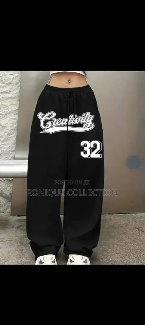 Unisex Black Cross Print Baggy Joggers – Stylish Streetwear Trousers