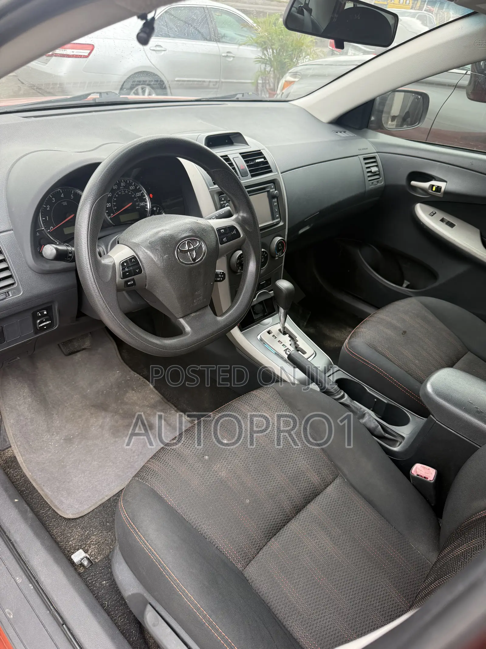 Toyota Corolla LE 4dr Sedan (1.8L 4cyl 4A) 2013 Orange