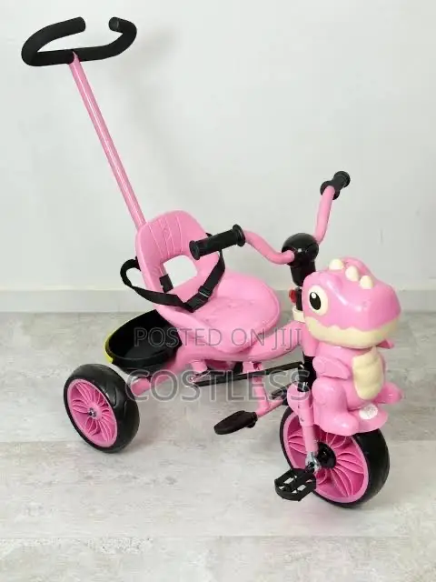 Dinosaur-Themed Tricycle Features a Rear Parental Push Handle