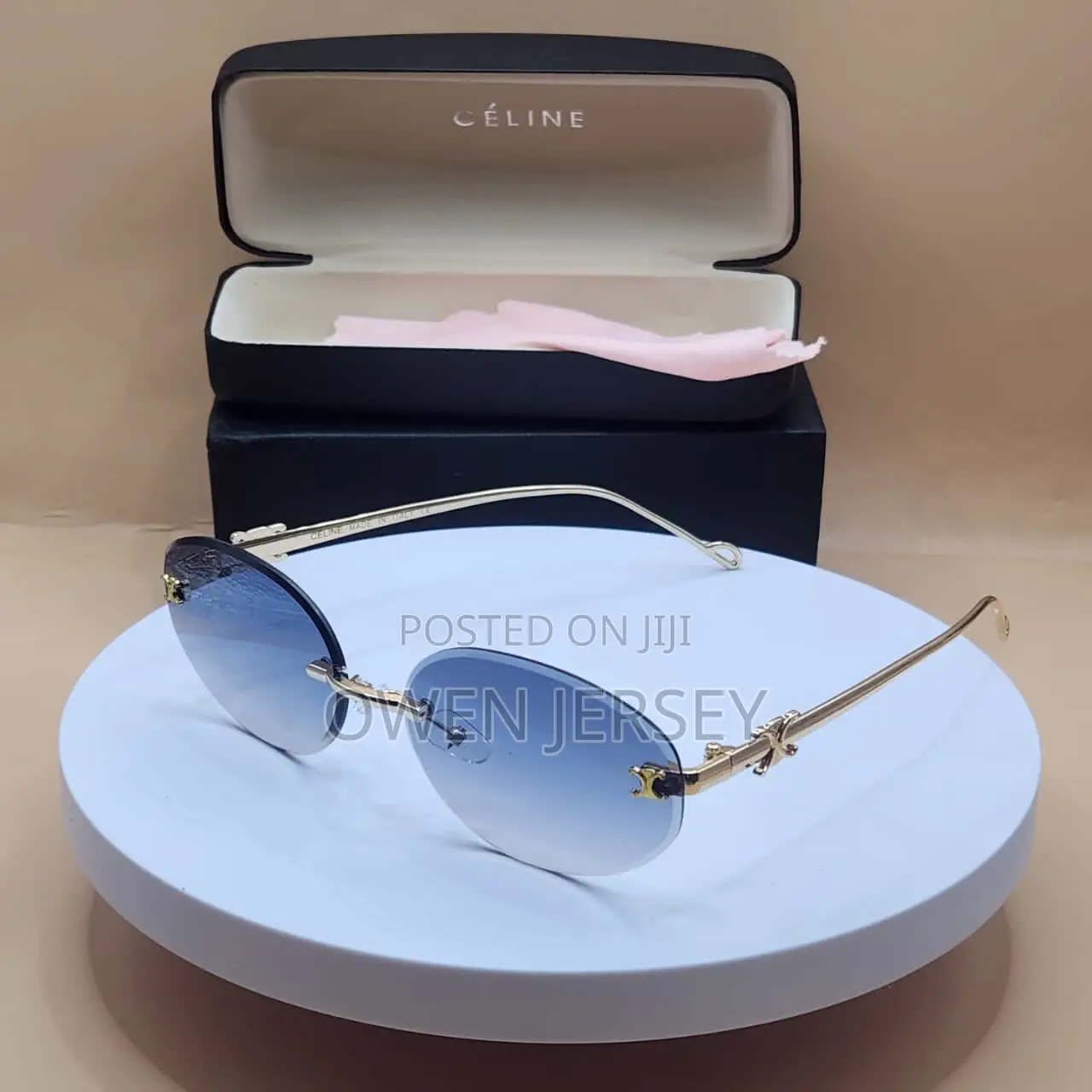 Céline Rimless Oval Sunglasses – Gold-Tone Metal With Blue Lenses