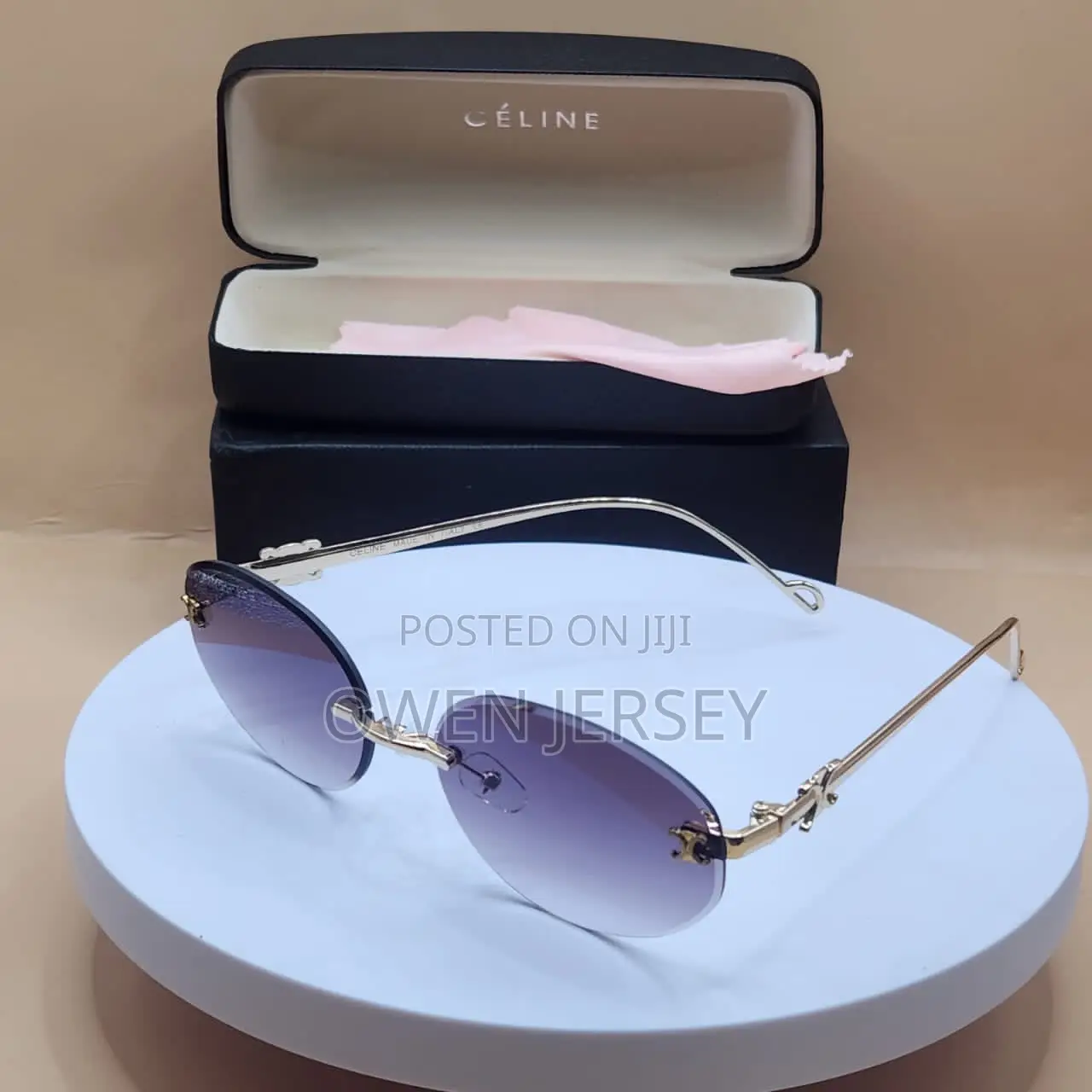 Céline Rimless Oval Sunglasses – Gold-Tone Metal With Blue Lenses