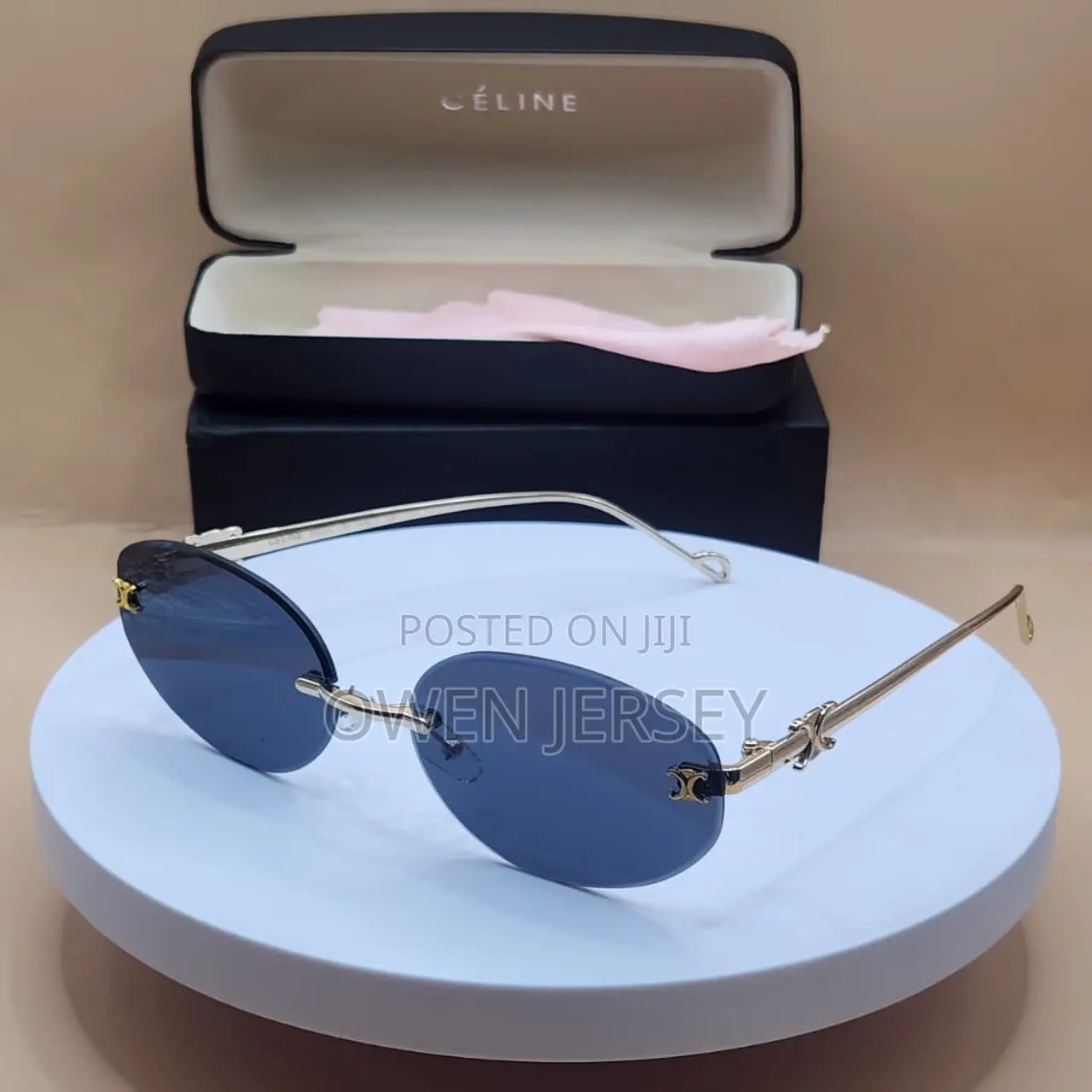 Céline Rimless Oval Sunglasses – Gold-Tone Metal With Blue Lenses