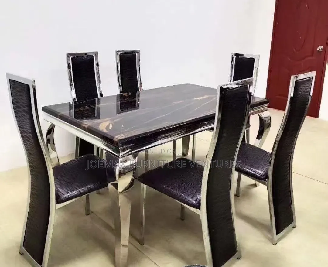High Quality Marble Dining Table and Six Leather Chairs.