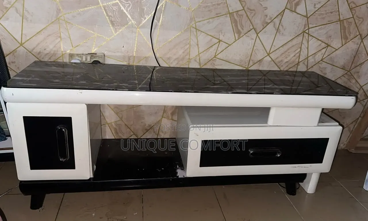 Imported Executive Adjustable Marble Top TV Stand
