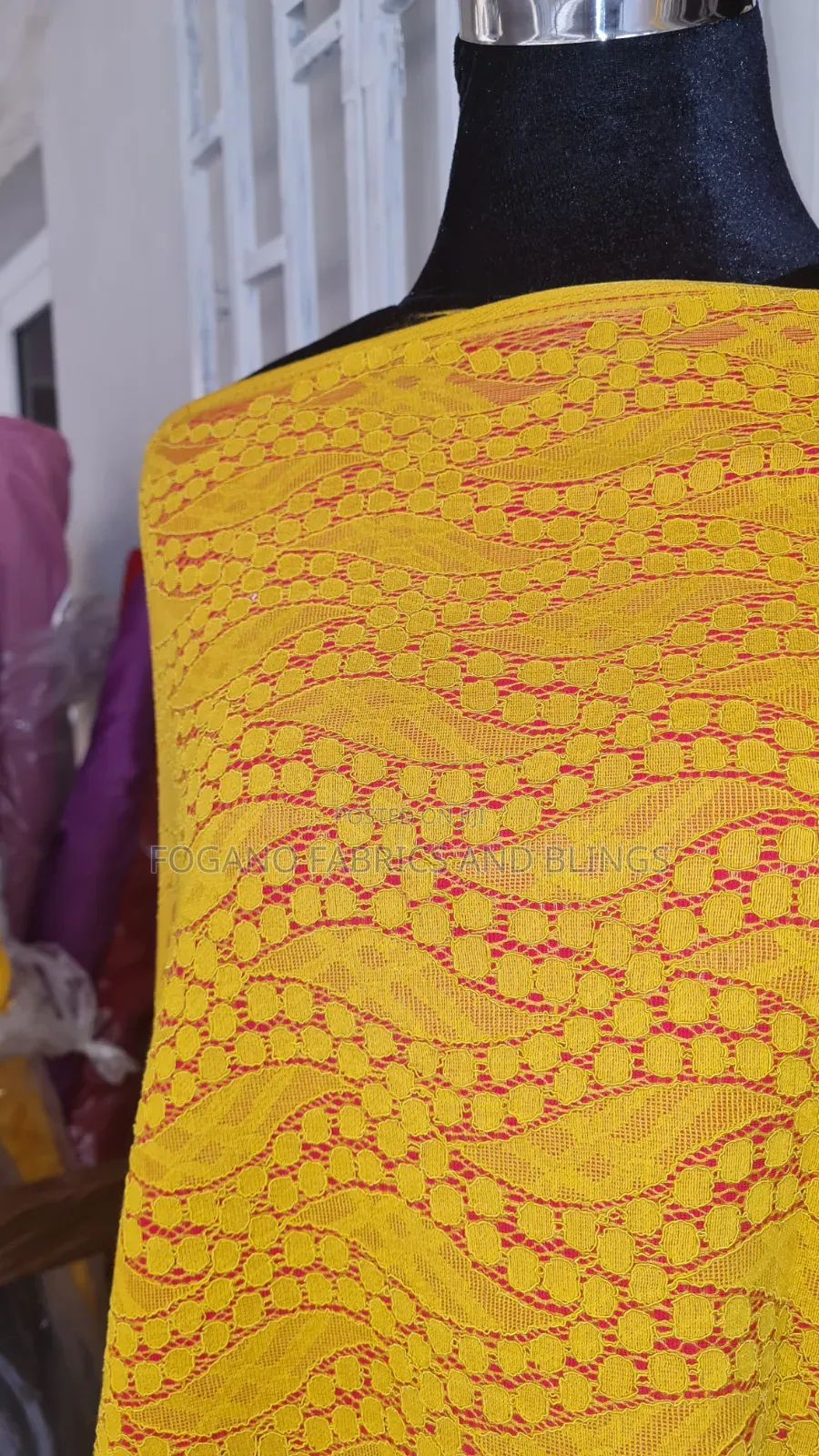 Yellow on Red Padded Lace Fabric