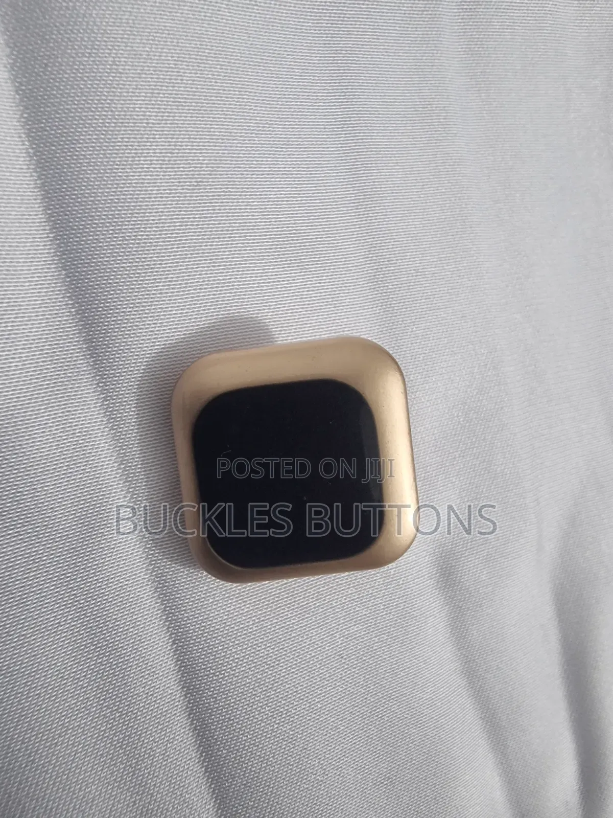 Gold and Black Metal Buttons