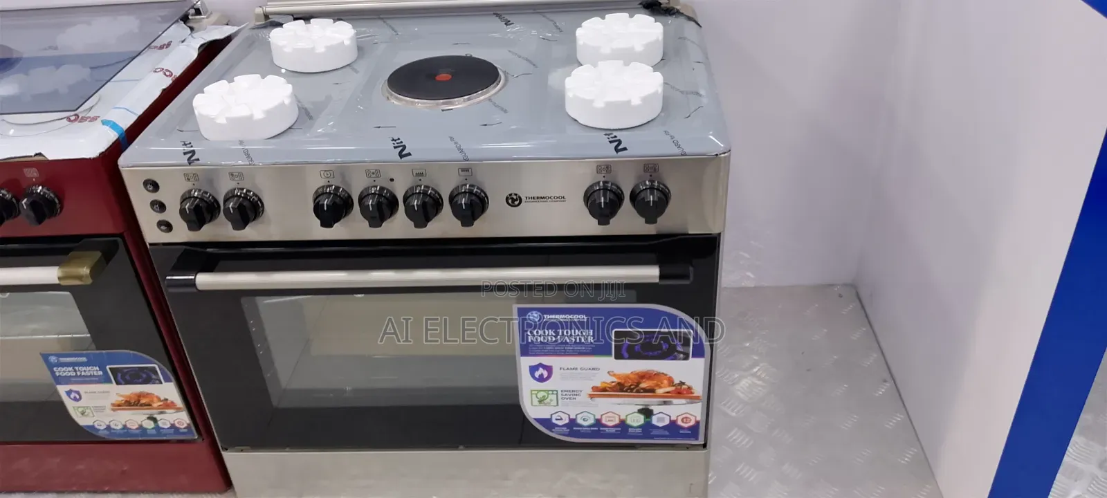 Haier Thermocool Standing Cooker (4) Gas and (1)electric Burner
