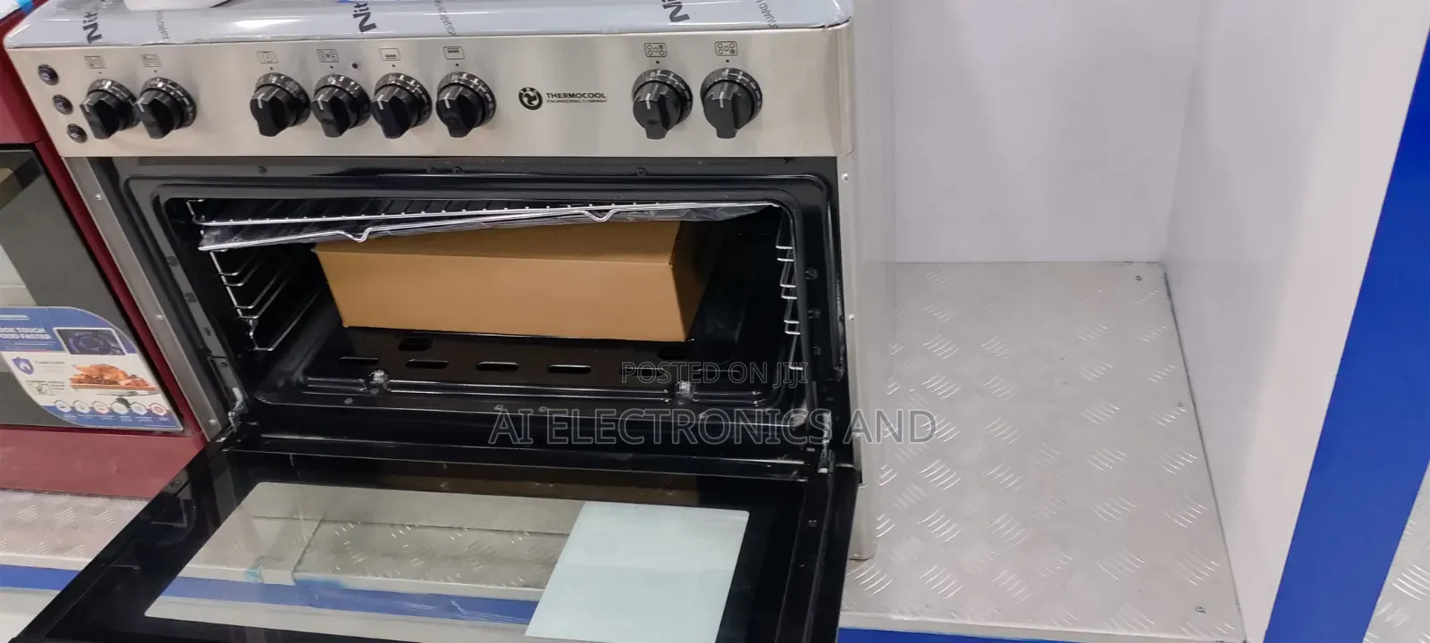 Haier Thermocool Standing Cooker (4) Gas and (1)electric Burner