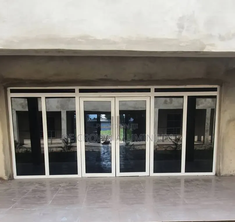 Premium Aluminium Swing Door With Fixed Glass Lights – Modern Design