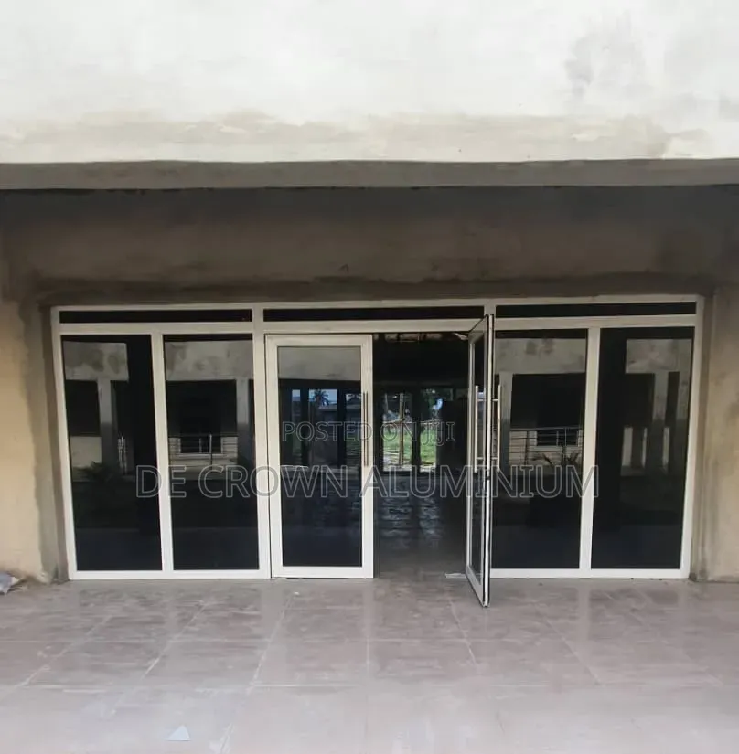 Premium Aluminium Swing Door With Fixed Glass Lights – Modern Design