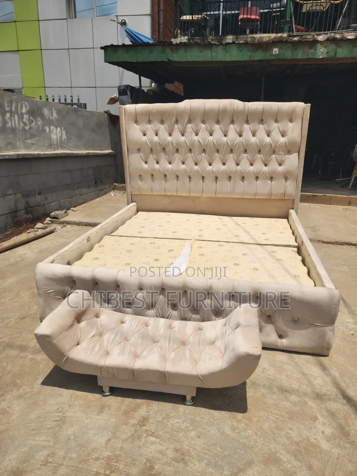 Neatly Padded 6by6 Cream Coloured Bed With Leg Rest.