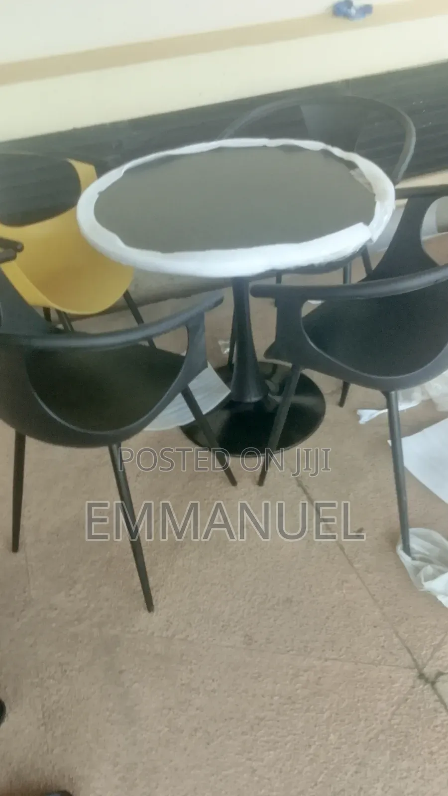 A Set of Outdoor Garden Table and Chairs