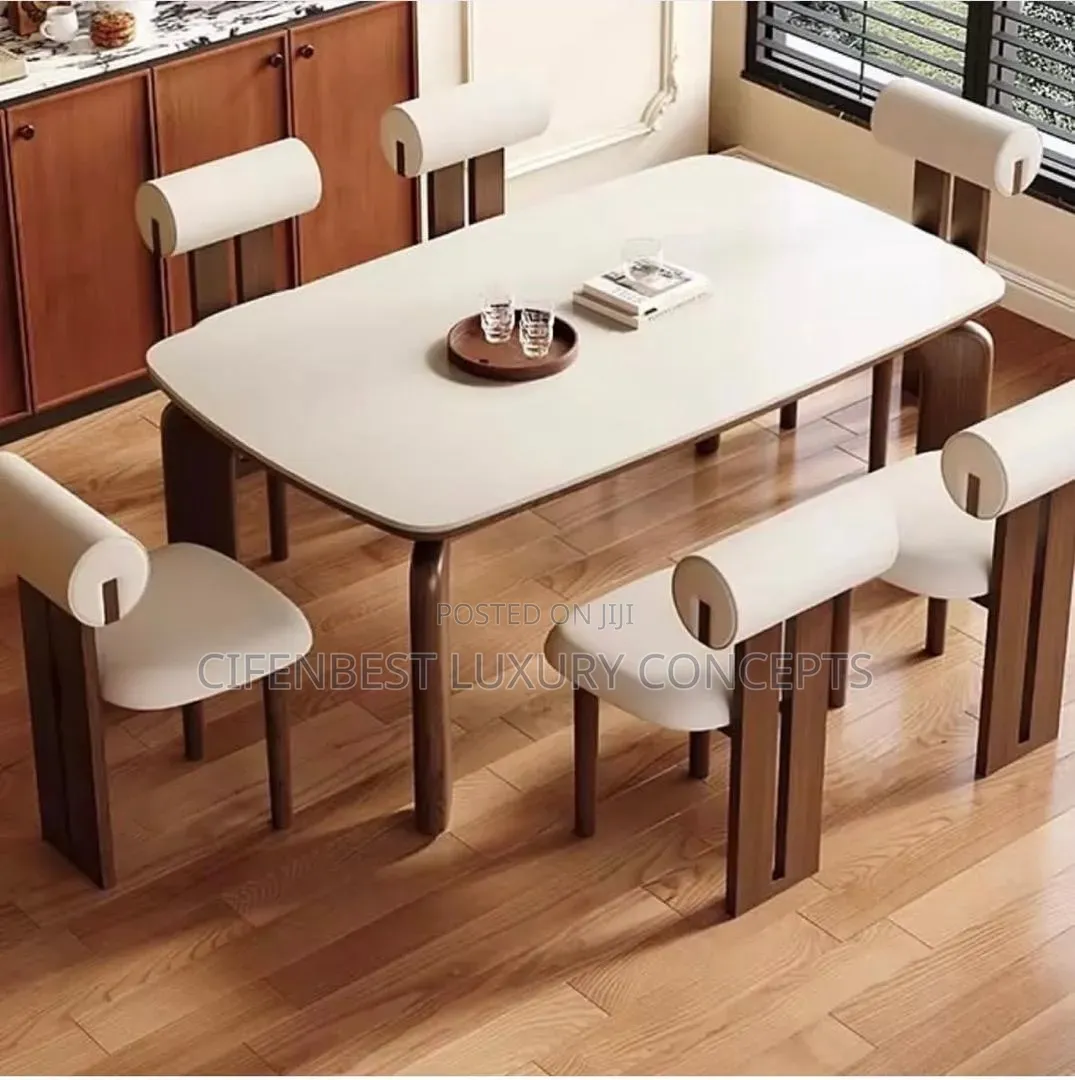 Executive Four Legged Dinning Table and 6 Fabric Chairs