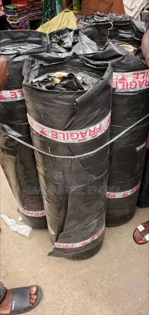 The Product in the Image Is a Roll of Heavy-Duty Black