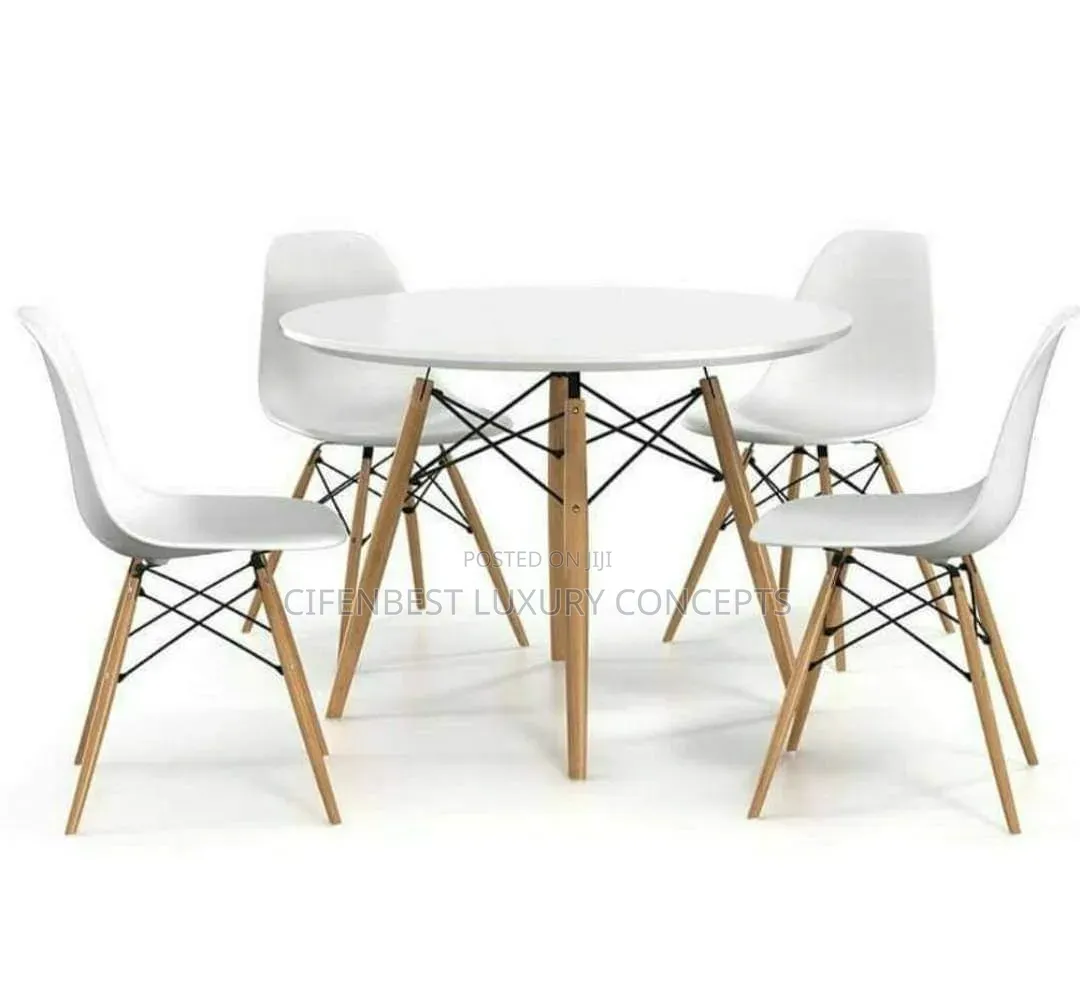Unique Round Wooden Top Table Restaurant With Four Sets of Chairs