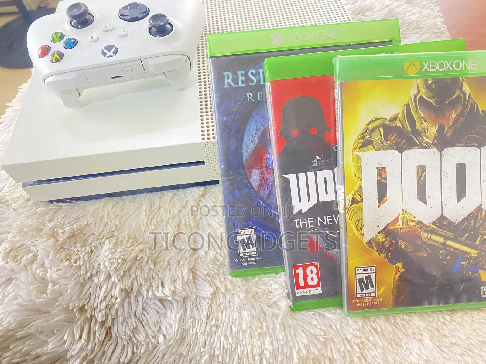 Xbox One S With One Pad and 2 Cd Games