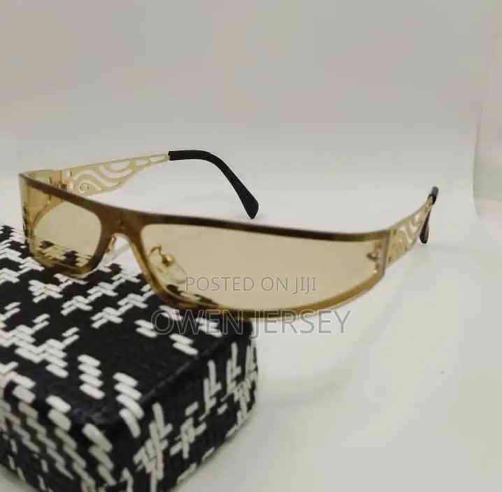 Black Wraparound Sunglasses With Patterned Temples.