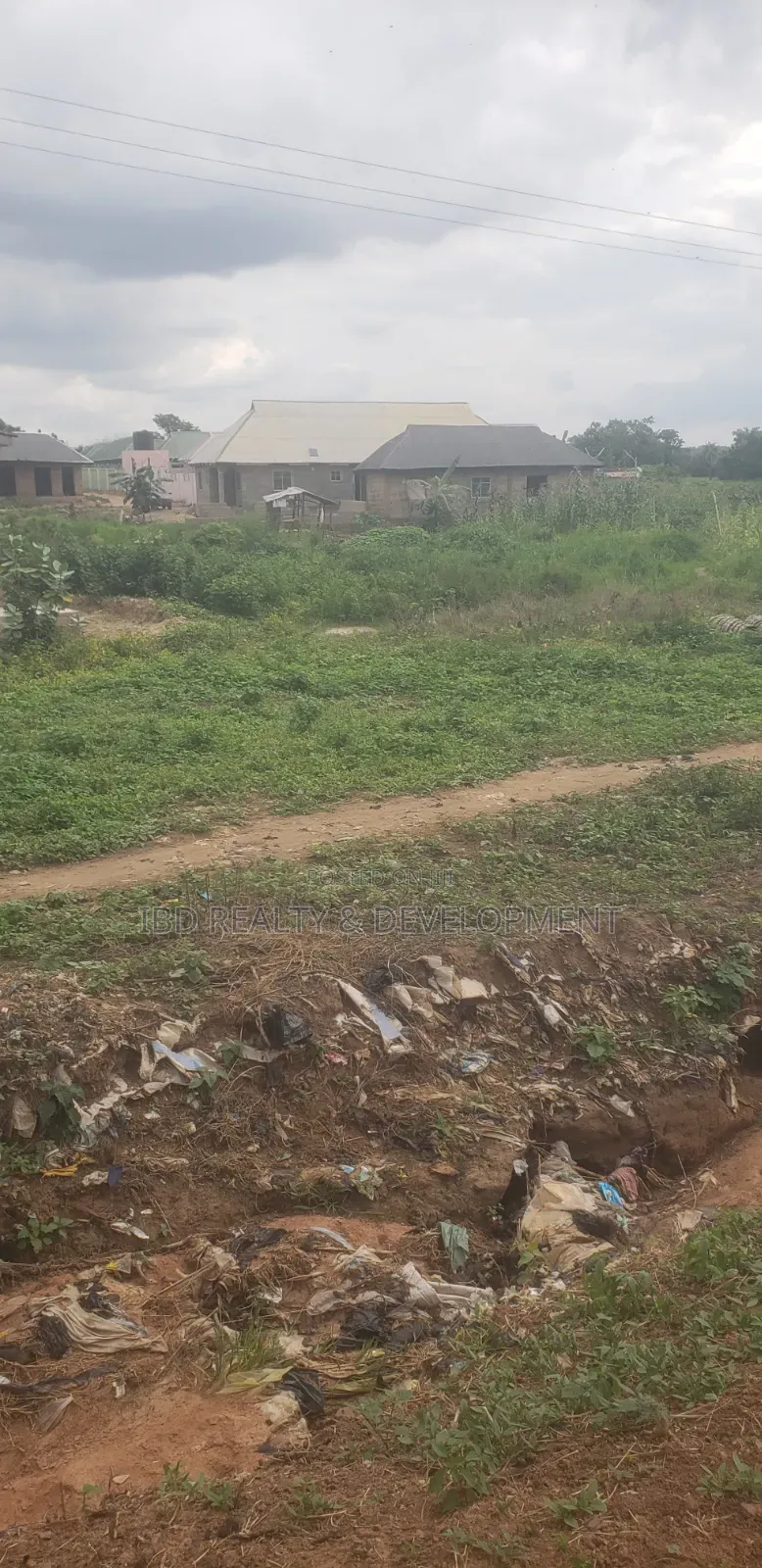 More Dan Plot of Land Facing D Main Access Federal Road With Setback