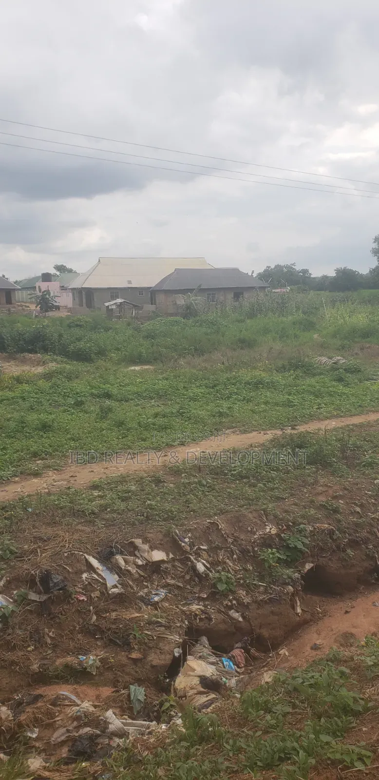 More Dan Plot of Land Facing D Main Access Federal Road With Setback